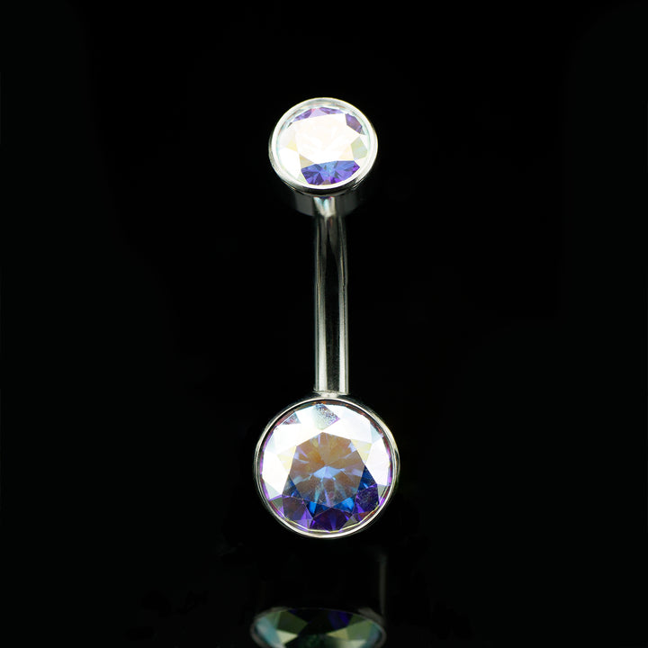 Navel curve with round iridescent gemstones at the top and the bottom on a black background.