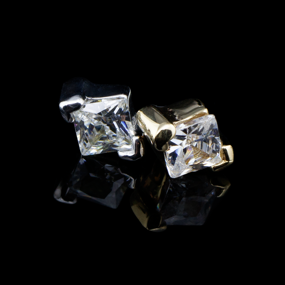 Two gold Celestial ends on a black background.