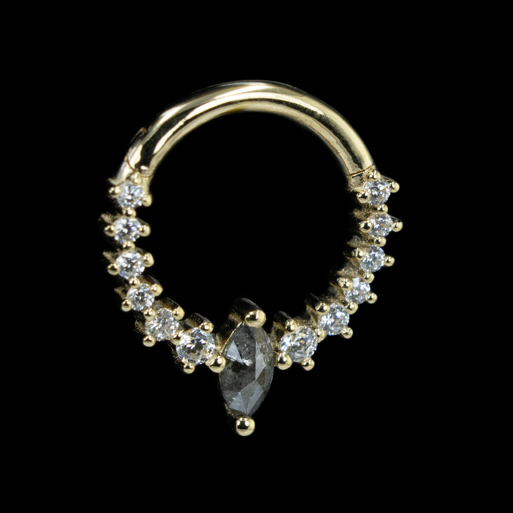 Yellow gold phantom clicker on a black background