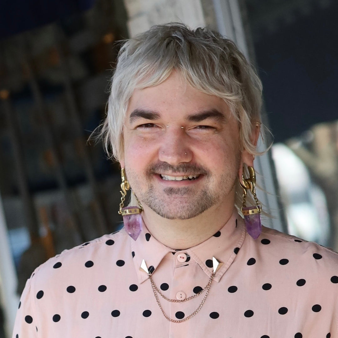 Portrait of Otto, Piercer at Deep Roots in Seattle, Washington.