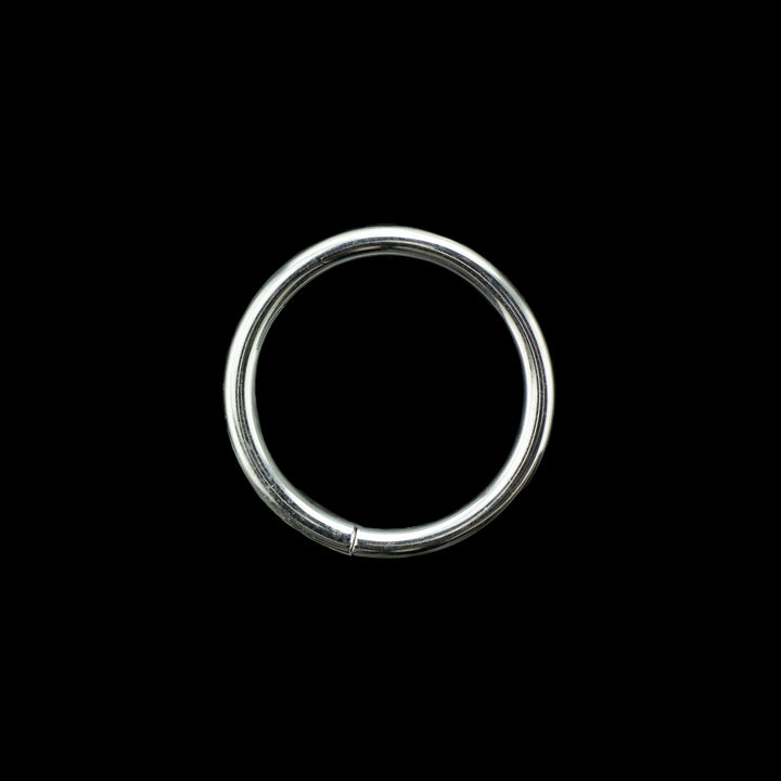 Solid white gold seamless hoop on a black background. A simple high polish ring for belly, navel, nostril, daith, cartilage, helix, rook, tragus, earlobe piercings. 