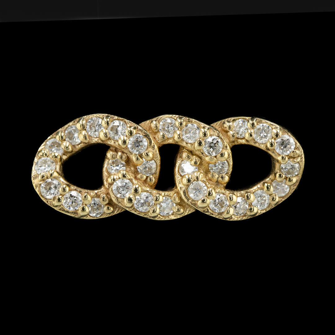 front view of a yellow gold piece of jewelry. Threadless end with three Cuban style links inset with white diamonds set in prongs. 