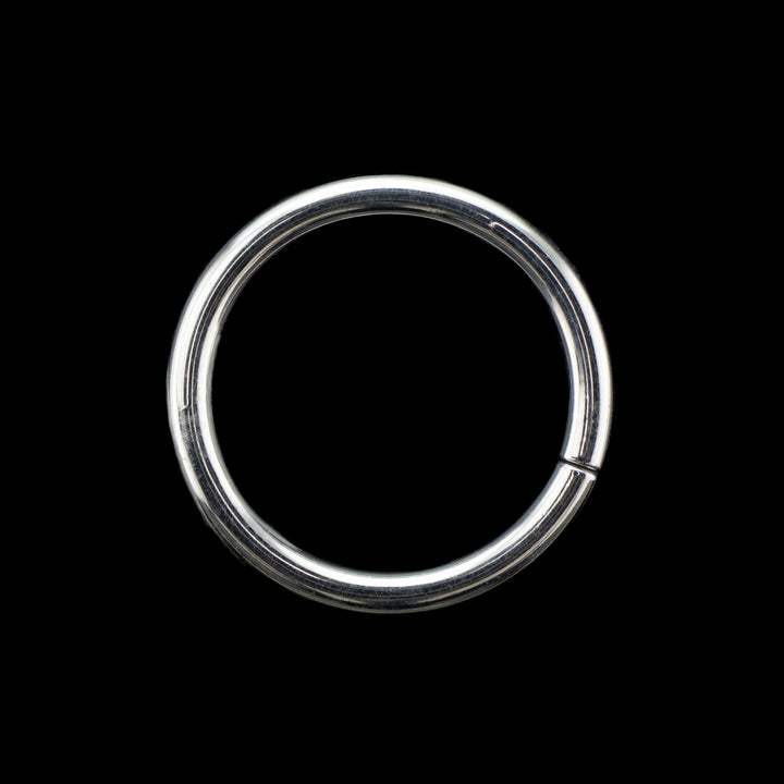 Solid white gold seamless hoop on a black background. A simple high polish ring for belly, navel, nostril, daith, cartilage, helix, rook, tragus, earlobe piercings. 